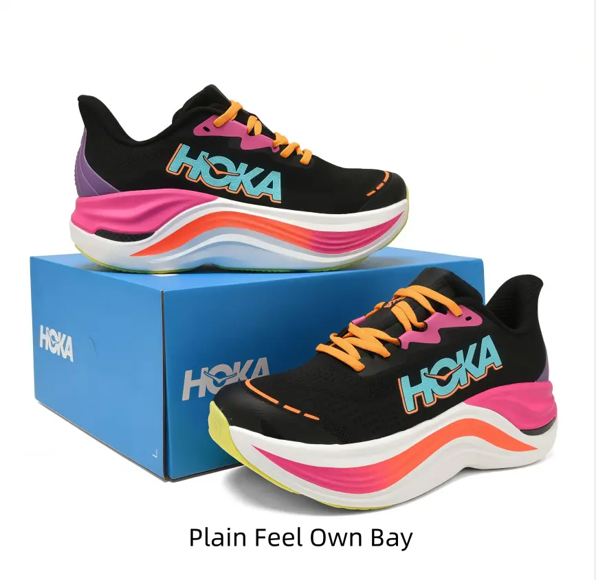 Black mesh running shoes matched with striking pink orange gradient midsoles create bold visual effects to grab views for street fashion video posts