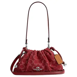 COACH Faye 26 Crossbody Bag for Women – Detachable Strap, Drawstring & Magnetic Closure, Denim, Leather, and Smooth Leather Blend, Red