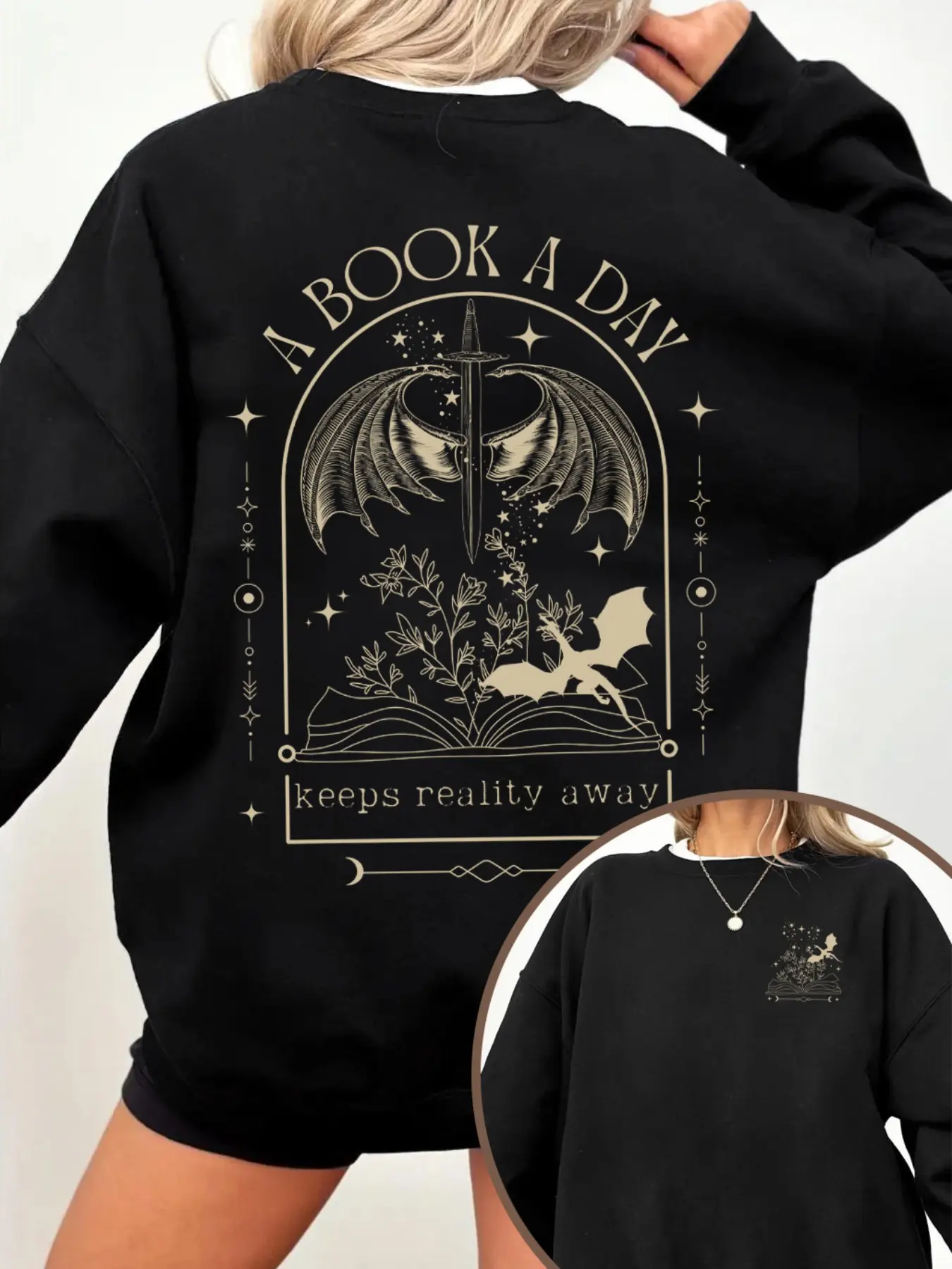 "A Book A Day Keeps Reality Away" Fantasy Bookish Sweatshirt, Loose, Black Oversize Crewneck with Dragon & Sword Art, Perfect for Fantasy Readers, Casual Outings, Literary Events, Unique Mythical Book Art, Graphic, Womenswear