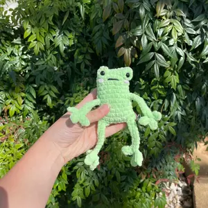 Hand crocheted leggy frog plushie