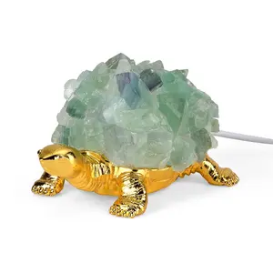 Crystal ornament with light in green