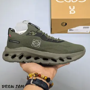 Cloud cushion running sneakers feature hollow segmented shock-absorbing foam outsole, crafted from ultra-breathable woven knit mesh, earthy olive green tonal monochrome design, lightweight slip-on fit
