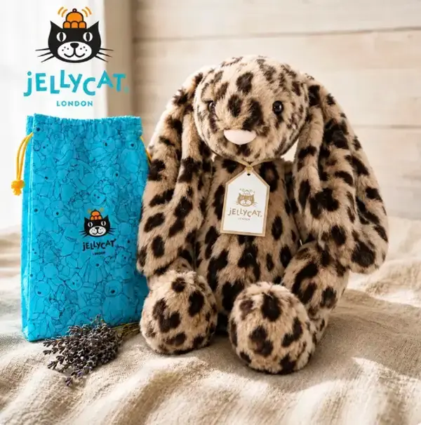Luxe Leopard-Print Bunny. This version features a fluffy, round pale-pink tail and ultra-soft, silky fur with a stylish leopard print—a meaningful gift.