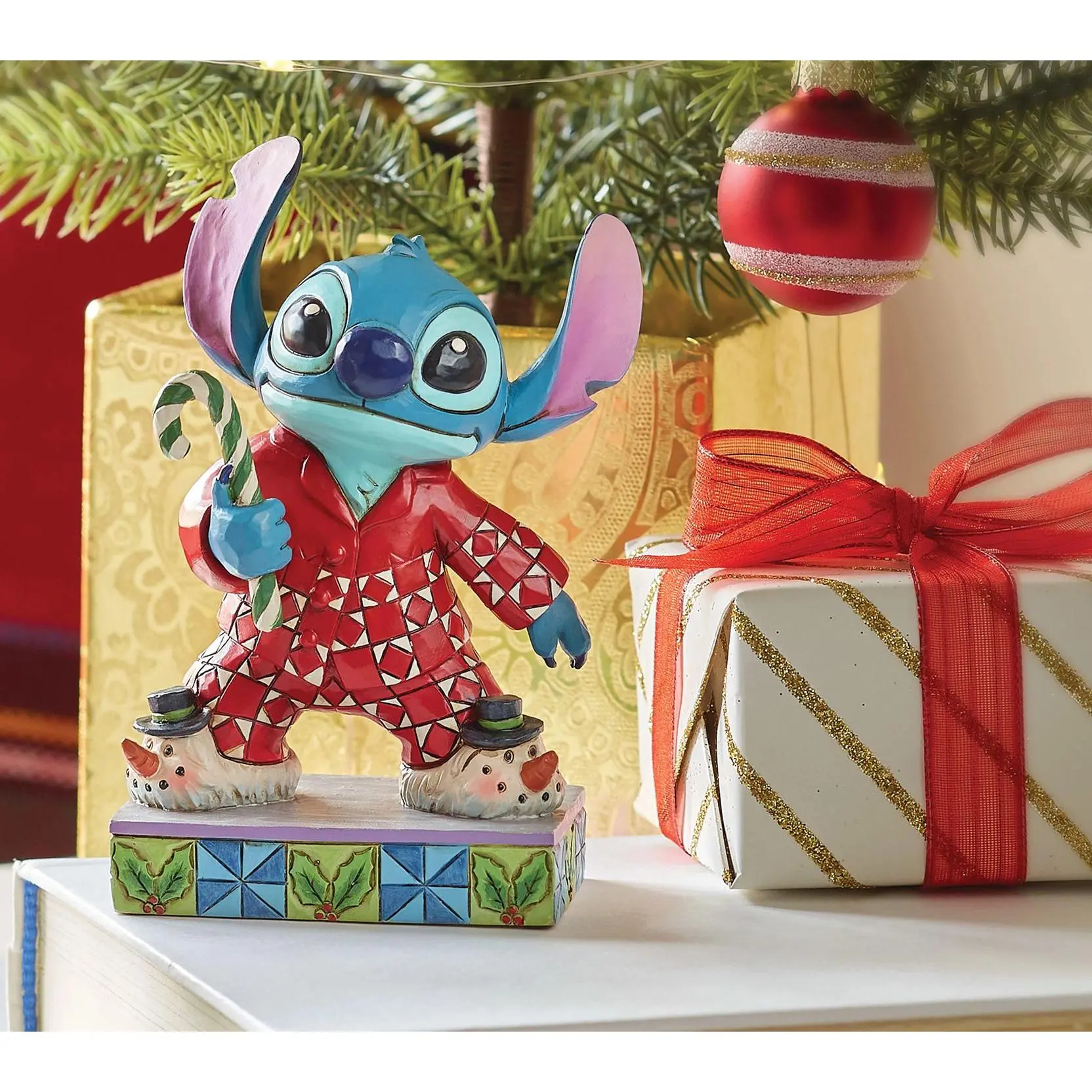 Disney Traditions Stitch in Christmas Pajamas Figurine