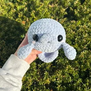 Hand-crocheted blue manatee