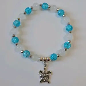 Tribal Sea Turtle Charm Bracelet with Color Beads and Silver Tone Charms