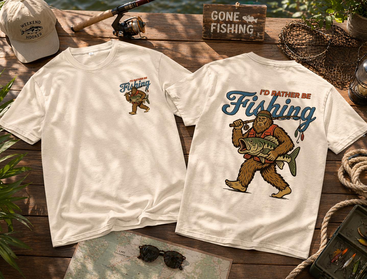 I’d Rather Be Fishing T-Shirt Funny Bigfoot Fisherman Graphic Tee for Men Women Vintage Style Outdoor Fishing Lover Shirt Casual Cotton Top Gift for Anglers Camping Hiking Weekend Wear