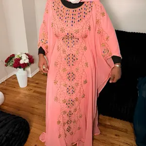 Luxury Hand Beaded Abaya in Soft Coral Pink with Gold Accents and Detailed Beadwork for Elegance