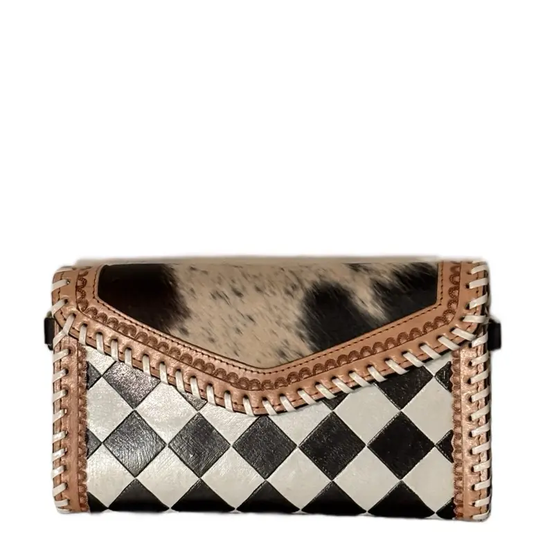 Hand painted leather clutch featuring real hair on hide front-comes with adjustable strap