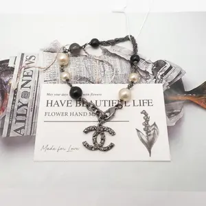 Pre-owned Chanel Gold Tone CC Pearl&Diamond Black&White Bracelet T10232946