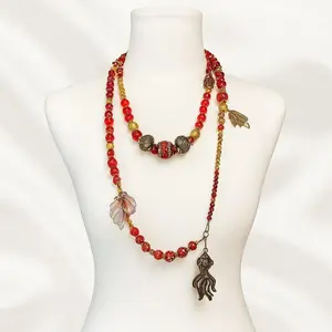 1002-KOI Red jade with glass beads and gold accents