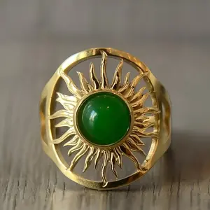 Inca Sun Motif Imitation Chalcedony Ring: Featuring an exotic and mysterious style, this ring is set with a round cabochon imitation chalcedony stone and crafted using openwork carving techniques. With its unisex design, it makes the perfect gift for him.