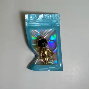 Space Suit - Gold Keychain