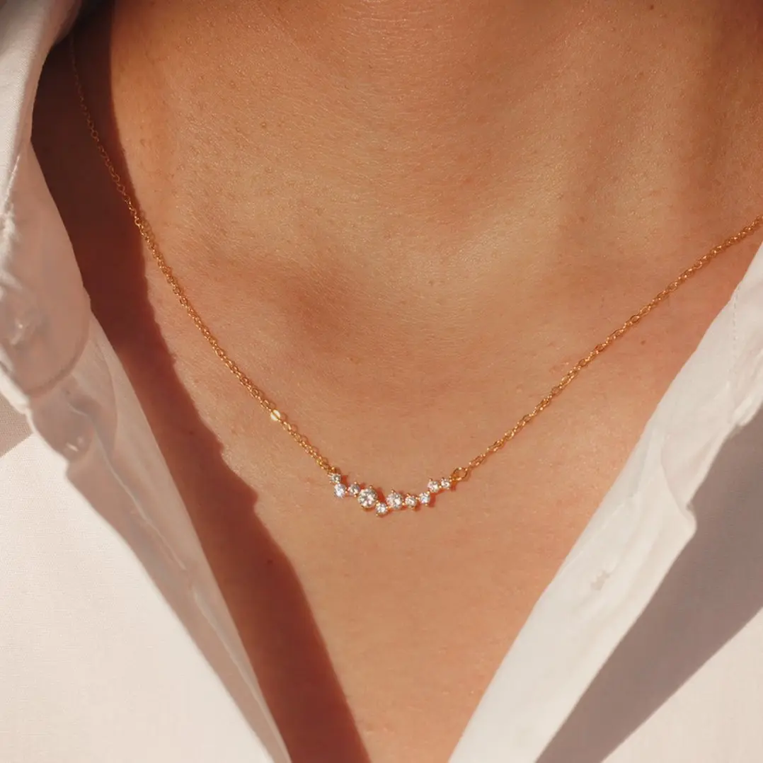 Rotnso Women's Dainty Gold Plated Necklace - Minimalist Starburst Shimmering Zircon Pendant, Casual Celestial Costume Jewelry with Polished Sheen & 42cm Adjustable Chain, Starburst Zircon