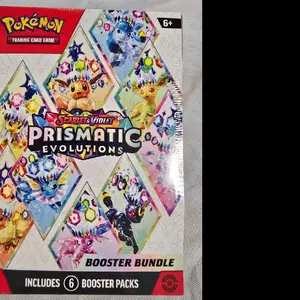 Pokémon Prismatic Evolutions Booster Bundle - Includes 6 Booster Packs for Trading Card Game Scarlet & Violet Edition