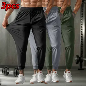 Men’s summer casual ice silk lightweight breathable stretch pants with a drawstring waist and zippered pockets, suitable for everyday wear and sports
