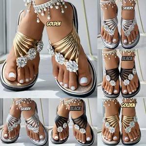 A pair of women's round-toe casual flat slippers with floral decorations.