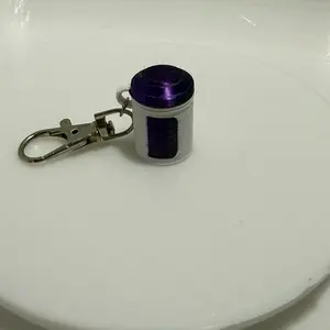 Sani Cloth badge keychain