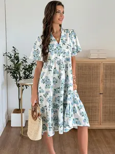 A women's fashionable Casual versatile white base blue hydrangea print V-neck short sleeve layered hem midi dress, suitable for shopping, afternoon tea, or commuting.