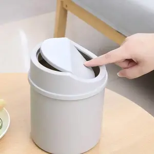1pc Mini Garbage Bin, Compact Size, Covered Small Trash Can, Desktop Trash Can, Plastic Desktop Waste Paper Basket, Swing-Top Design To Prevent Odor Leakage, For Storing Fruit Peel And Paper Scraps On Desk To Keep Tidy, For Home Office Desk Decor