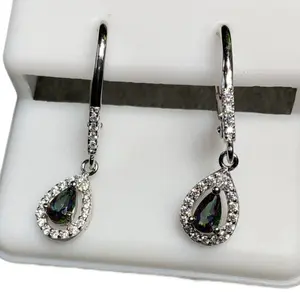 These earrings are tear shaped and are dangle style! These earrings are Mystic topaz with AAA CZs. The setting is 100% 925 Sterling silver!
