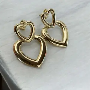 Flat Heart-Shaped Earrings - Gold Finish, Simple Design, Ideal for Everyday Wear Pretty Studs