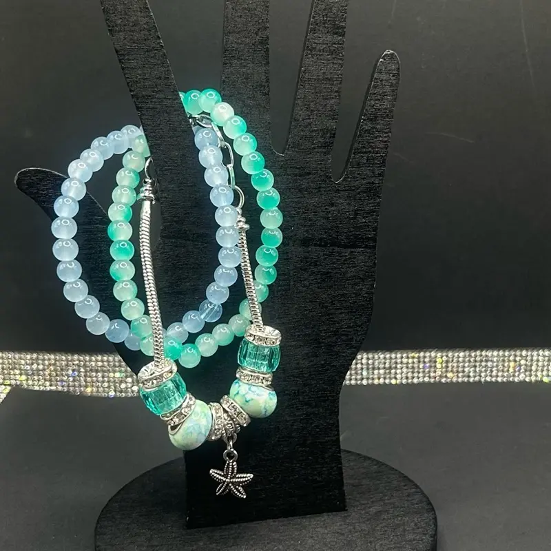 Snake  Baby Blue -Teal Bracelet with Starfish charm and 2 matching bracelets.