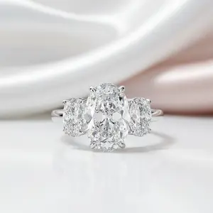 White Gold White Sapphire Oval Cut Three Stone Engagement Ring