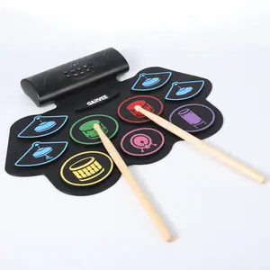 🥁 Roll it up and rock out—anywhere! 9-pad electronic drum kit with Bluetooth, built-in speaker, and colorful LED lights. Link in bio!