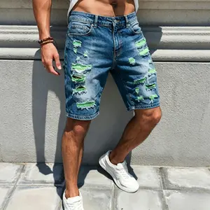 Men’s trendy, edgy color-block denim shorts—street style, distressed vintage look, mid-thigh length