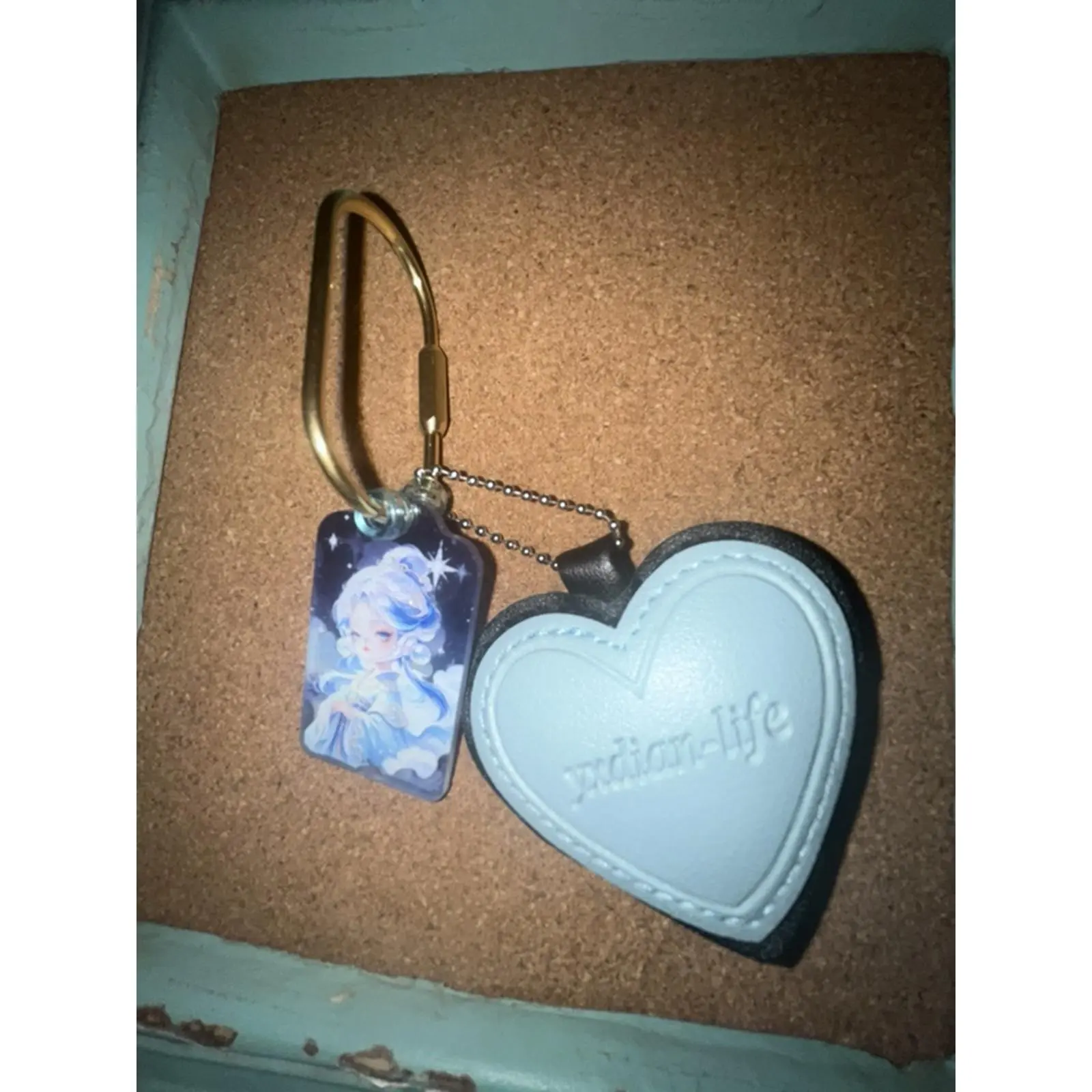 Skull panda with leather heart bag charm