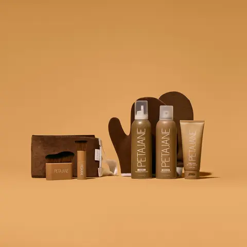 The Perfectionist Bundle - At Home Professional Self Tanning Kit includes tanning mousse, tanning mist, tanning lotion, tanning mitt, back applicator, face brush, body brush and exfoliating mitt.