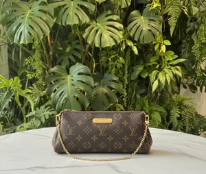 Pre-owned Louis Vuitton Canvas and leather Shoulder Bags Monogram Eva Pochette