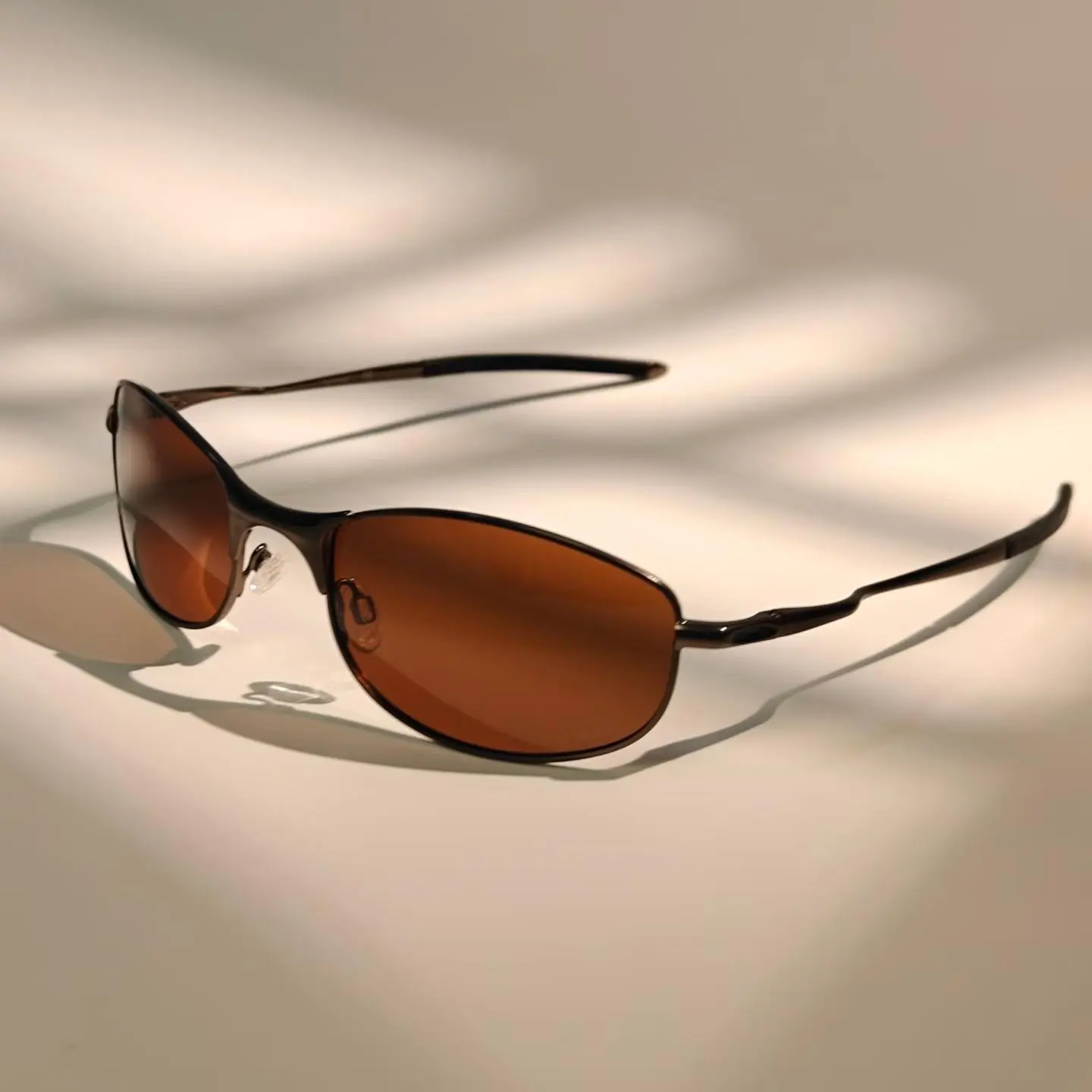 Minimalist Thin Metal Rim Polarized Oval Sunglasses, Warm Amber Lenses, Ergonomic Curved Temples, for Outdoor Beach Photoshoot Fashion Use
