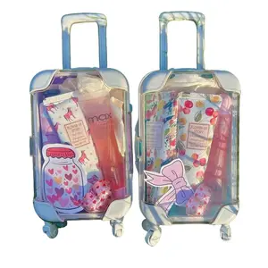 Mini Suitcase Bundle with Self-Care Items - Lip-glosses, Lip Balms, Hand-cream, Scrunchies & More | Portable Mini Suitcase for Teens - Hydrating and Moisturizing lip care kit.
