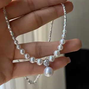 Imitation shell pearl design necklace, retro luxurious and elegant adjustable sweater chain, simple and multifunctional daily jewelry gift for couples