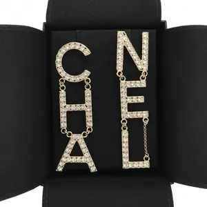 Pre-owned Chanel Runway CHA NEL letter Earrings