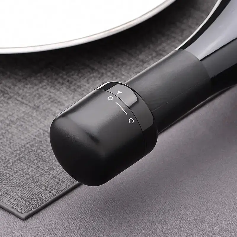 Vacuum wine stopper. Creative wine stopper. For champagne and wine, red wine and liquor; a sealing device with a built-in vacuum function; leakproof and reusable wine stopper with a vent.