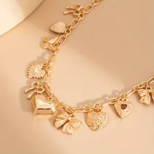 European and American Punk Style Heart-shaped Pendant Necklace, Alloy Collarbone Chain, Paired with Bow Tassel Design, Trendy Retro Elements, Light Luxury Versatile, Suitable for Daily, Party or Street Style Dressing, Showcasing Unique Fashion Charm