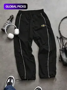 Men's Casual Sporty Long Pants, Loose Fit with Elastic Cuffs, Fashion Letter Print, Lightweight Fabric for Daily Wear, Casual Sports Pants