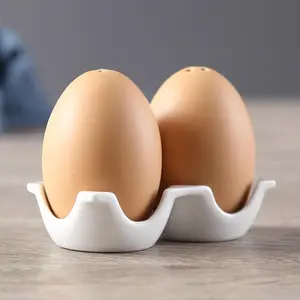 Creative Ceramic Salt and Pepper Bottle Set with Mini Brown Egg Shaped Bottles and Stand for Kitchen Home and Table Decoration Canister Unique Paper Box Design