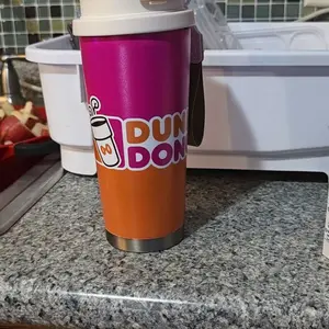 An 18-ounce stainless steel coffee mug, designed to be leak-proof, perfect  as a gift, and printed with the Dunkin' Donuts logo - TikTok Shop