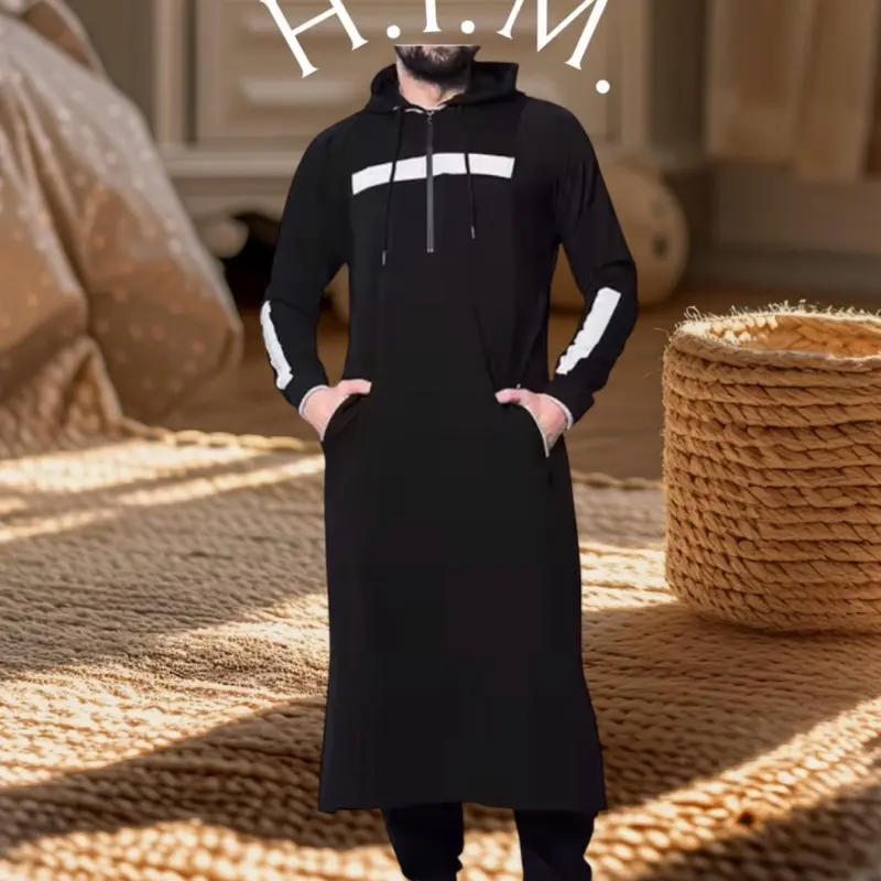 Men’s Hooded Thoub (Mens Islamic Wear) Colors available are: Grey/White/Army Green. It is Designed with Stripe across the chest and a stripe along the sleeves. This Thoub is Long Sleeved and has a Drawstring Closure at the neck line and two side pockets.