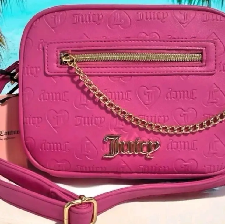 Juicy Couture Pink Embossed Crossbody Bag with Gold Chain Strap and Zipper Closure
