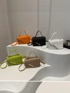 Vibrant diamond-patterned mini bag to brighten your stylish daily life.   Solid-color diamond-embossed handbag.   Trendy all-season new shoulder crossbody bag.