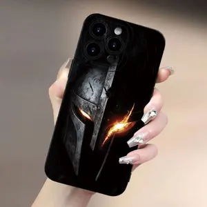 A Mobile Phone Case Featuring a Spartan Warrior Design, Offering Full-Body Protection with Shockproof And Drop-Proof TPU Soft Rubber. It Comes in a Sleek Black Color Suitable for Both Men And Women, Compatible with Iphone Models 16, 15, 14, 13, 12, 11Xs,