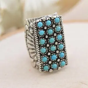 Turquoise Statement Ring with Intricate Silver Accents and Vibrant Blue Stones for Bold Fashion Statements