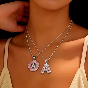 FAITHOPIA 2 Pack Initial Pendant Necklaces  Women, Pink Cubic Zirconia Alphabet Necklace Set, A-Z Letter Charm Jewelry, Dainty Layered Necklaces, Fashion Gift  Birthday, Party, Everyday Wear for