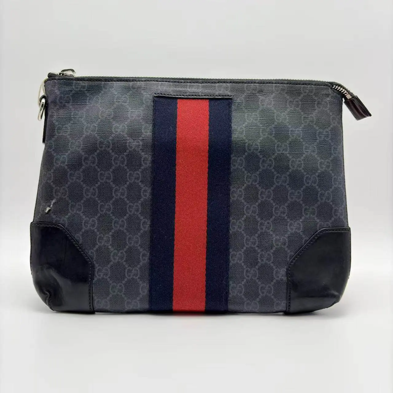 Pre-owned GUCCI Italy Clutches & Wristlets black flower red and blue stripes