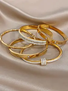 5pcs Set Gold Plated Stainless Steel Bracelets, Stackable Crystal Bangle Collection, Bracelet with Charms, Hinged Design with Cubic Zirconia, Bamboo Texture & Clover Charm, Elegant Fashion Jewelry for Daily Wear & Gifting